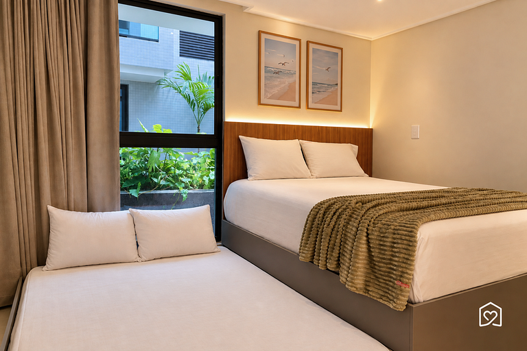 Flat à 50m da praia com vista para o jardim