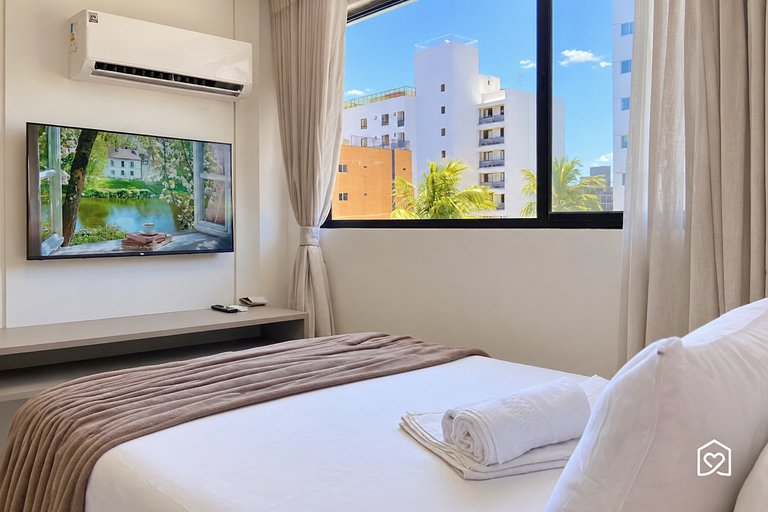 Flat c/ piscina e rooftop vista mar perto da praia