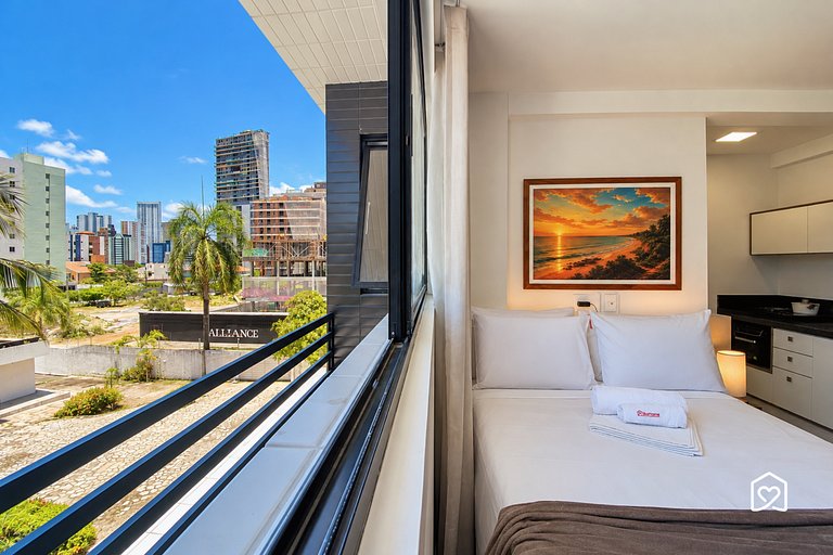 Flat c/ piscina e rooftop vista mar perto da praia
